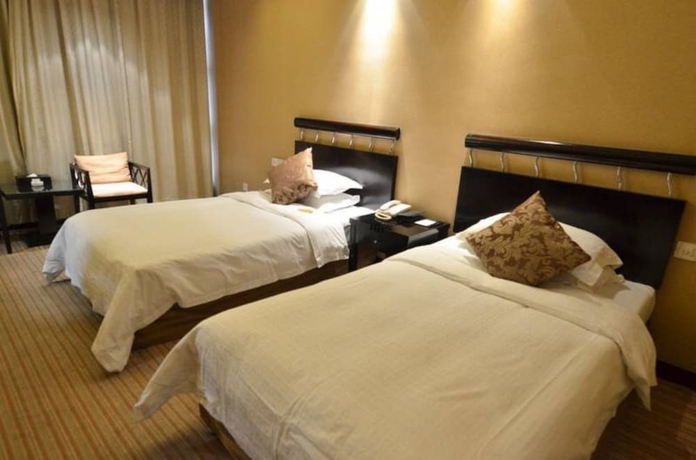 Imagen de la habitación del Hotel Hangzhou Haiwaihai Nachuan. Foto 7