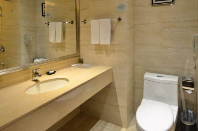Imagen de la habitación del Hotel Hangzhou Haiwaihai Nachuan. Foto 9