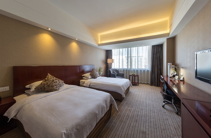 Imagen de la habitación del Hotel Hangzhou Haiwaihai Nachuan. Foto 10