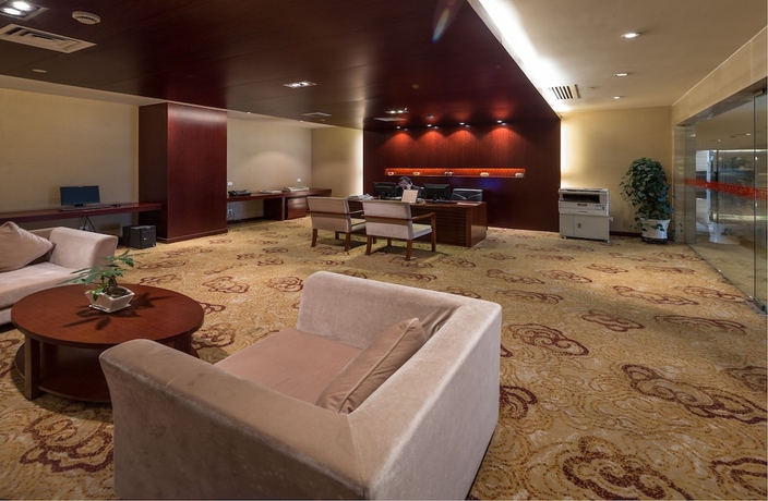 Imagen de los interiores del Hotel Hangzhou Haiwaihai Nachuan. Foto 12