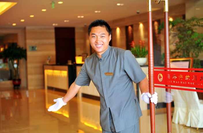Imagen de los interiores del Hotel Hangzhou Haiwaihai Nachuan. Foto 14