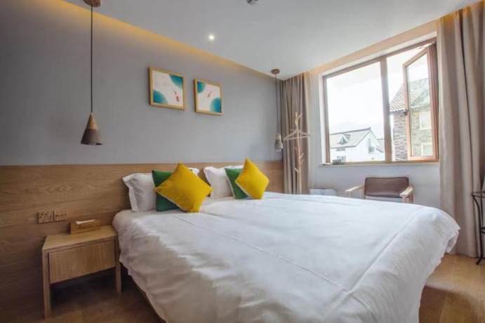 Imagen de la habitación del Hotel Hangzhou Hanxuan. Foto 18