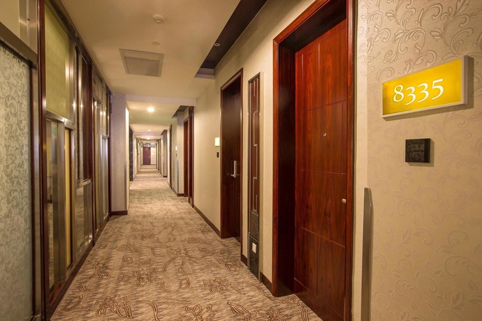Imagen de los interiores del Hotel Hangzhou Hua Chen International. Foto 16