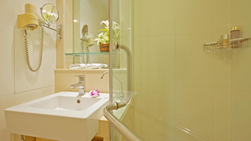 Imagen de la habitación del Hotel Hangzhou Hua Chen International. Foto 14