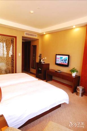 Imagen de la habitación del Hotel Hangzhou Lotus Hotel. Foto 8