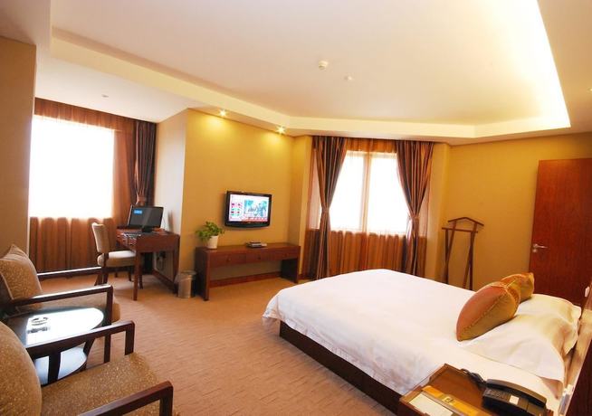 Imagen de la habitación del Hotel Hangzhou Lotus Hotel. Foto 9