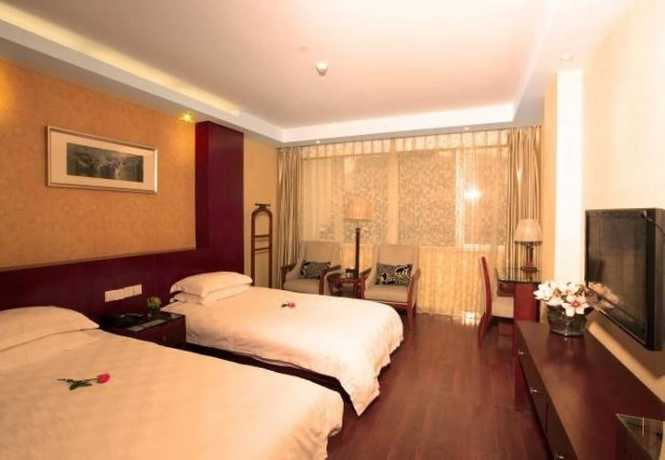 Imagen de la habitación del Hotel Hangzhou Lotus Hotel. Foto 10