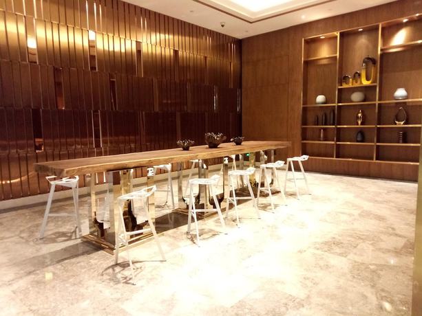 Imagen de los interiores del Hotel Hangzhou Magician Apartment. Foto 20