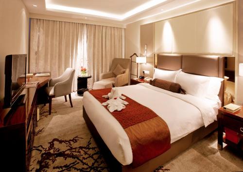 Imagen de la habitación del Hotel Hangzhou Meiyuan. Foto 4