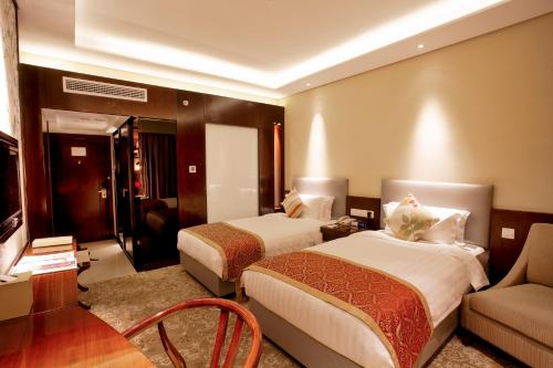 Imagen de la habitación del Hotel Hangzhou Meiyuan. Foto 7