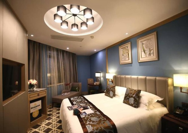 Imagen de la habitación del Hotel Hangzhou New Jiulong. Foto 2