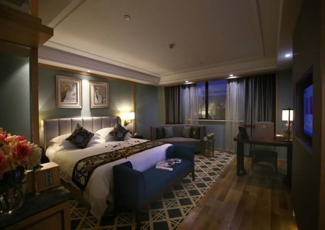 Imagen de la habitación del Hotel Hangzhou New Jiulong. Foto 3