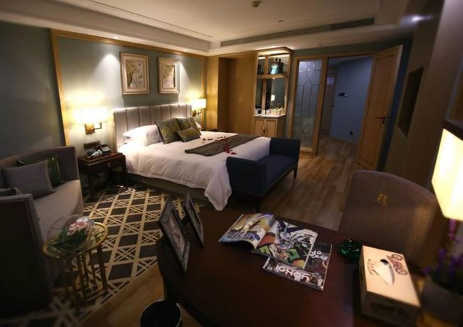 Imagen de la habitación del Hotel Hangzhou New Jiulong. Foto 4