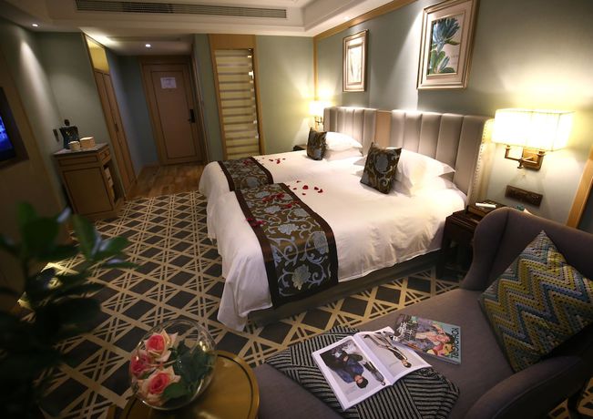 Imagen de la habitación del Hotel Hangzhou New Jiulong. Foto 5