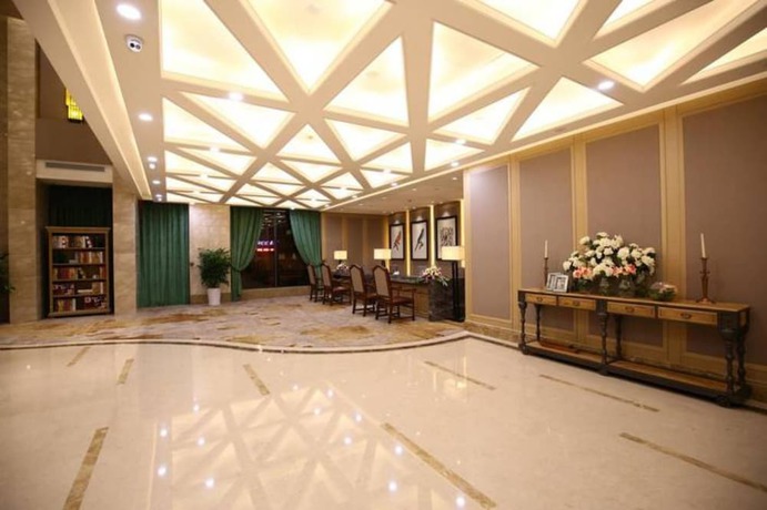 Imagen de los interiores del Hotel Hangzhou New Jiulong. Foto 20