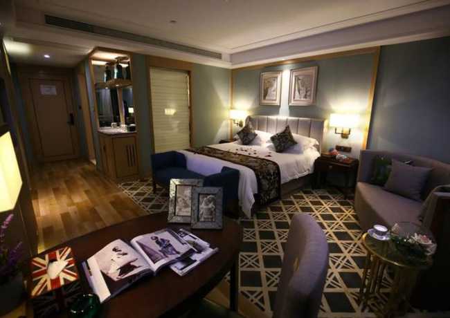Imagen de la habitación del Hotel Hangzhou New Jiulong. Foto 12