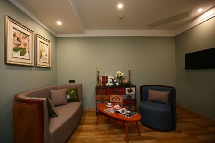 Imagen de la habitación del Hotel Hangzhou New Jiulong. Foto 13