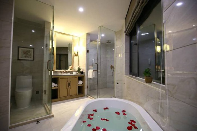 Imagen de la habitación del Hotel Hangzhou New Jiulong. Foto 14