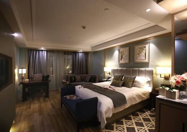 Imagen de la habitación del Hotel Hangzhou New Jiulong. Foto 15