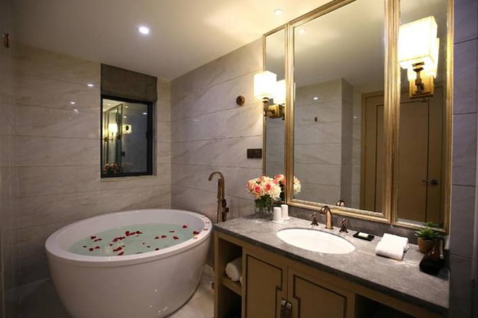 Imagen de la habitación del Hotel Hangzhou New Jiulong. Foto 17