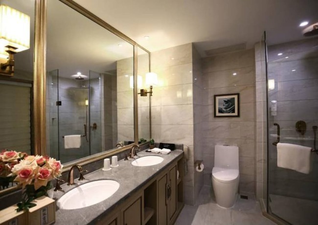 Imagen de la habitación del Hotel Hangzhou New Jiulong. Foto 18