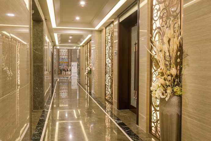 Imagen de los interiores del Hotel Hangzhou Ouyamei International. Foto 16