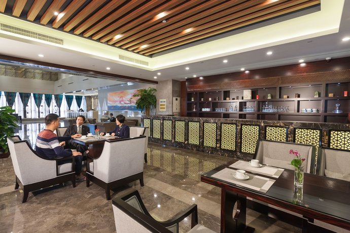 Imagen de los interiores del Hotel Hangzhou Ouyamei International. Foto 18