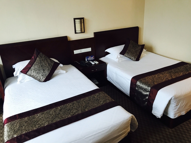 Imagen de la habitación del Hotel Hangzhou Qiandaohu Waigaoqiao. Foto 15