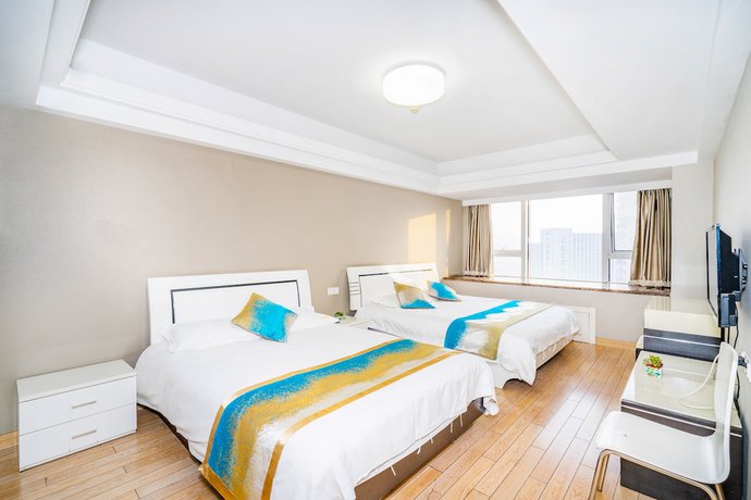 Imagen de la habitación del Hotel Hangzhou Shengteng. Foto 8