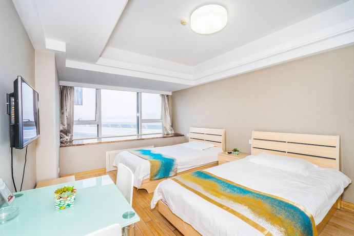 Imagen de la habitación del Hotel Hangzhou Shengteng. Foto 10