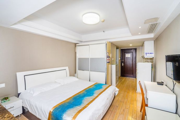 Imagen de la habitación del Hotel Hangzhou Shengteng. Foto 11