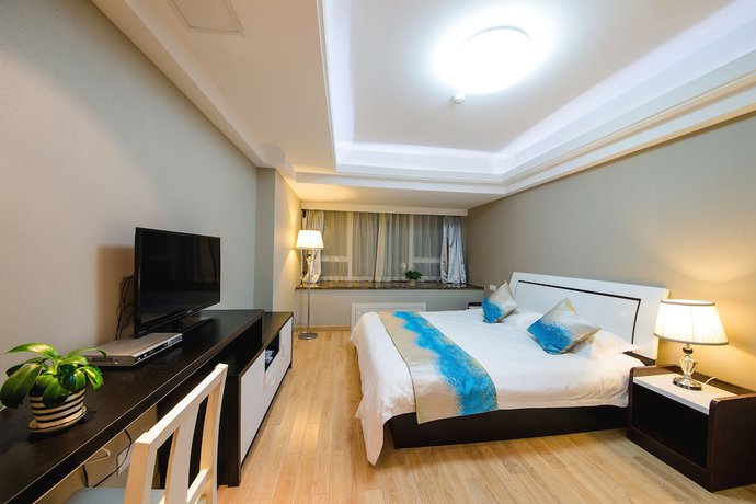 Imagen de la habitación del Hotel Hangzhou Shengteng. Foto 12