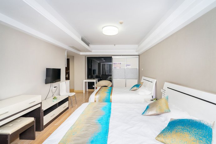 Imagen de la habitación del Hotel Hangzhou Shengteng. Foto 17