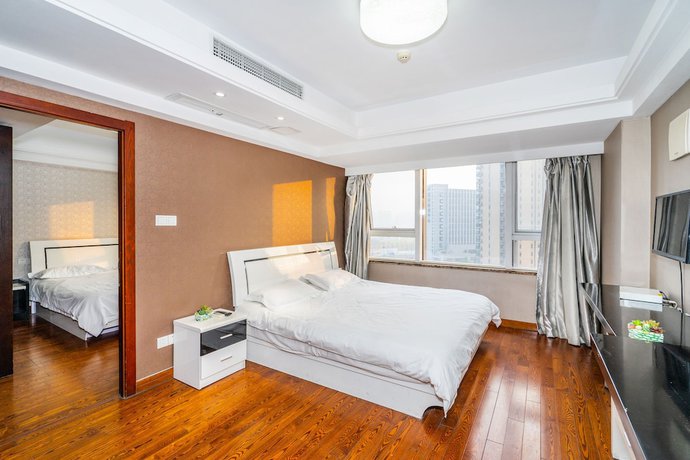 Imagen de la habitación del Hotel Hangzhou Shengteng. Foto 18