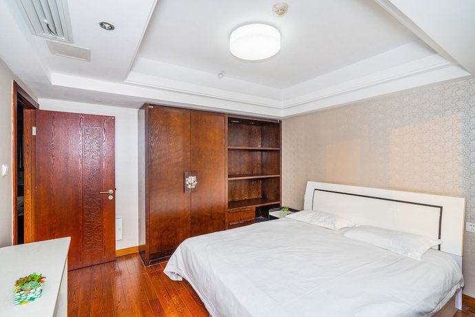 Imagen de la habitación del Hotel Hangzhou Shengteng. Foto 19