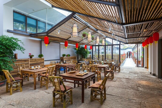 Imagen del bar/restaurante del Hotel Hangzhou Shusheng Resort. Foto 4
