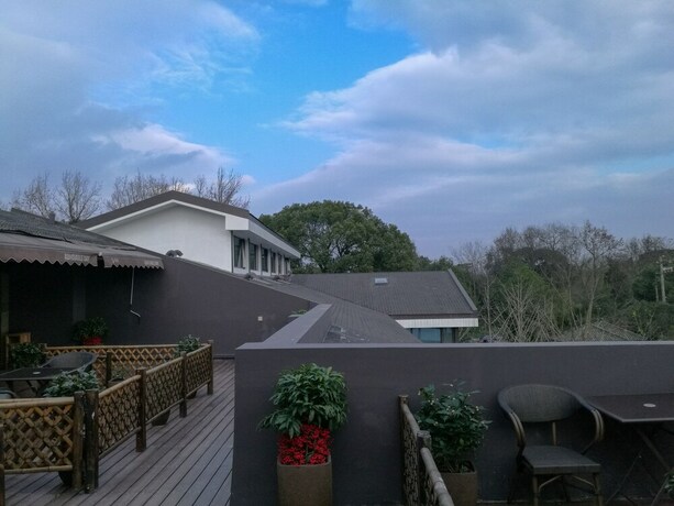 Imagen de los interiores del Hotel Hangzhou Shusheng Resort. Foto 12