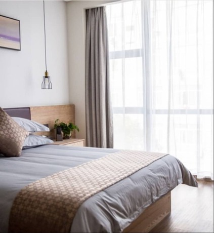 Imagen de la habitación del Hotel Hangzhou Tbo. Foto 4