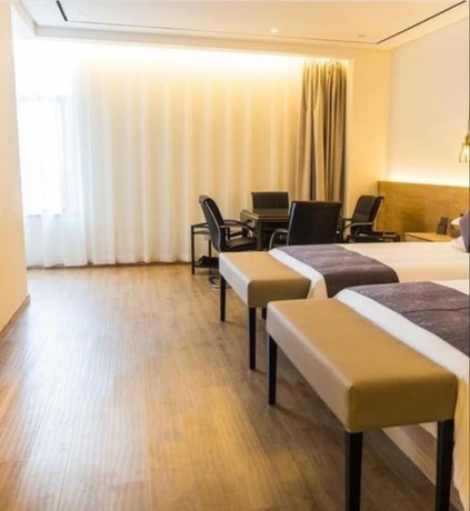 Imagen de la habitación del Hotel Hangzhou Tbo. Foto 5