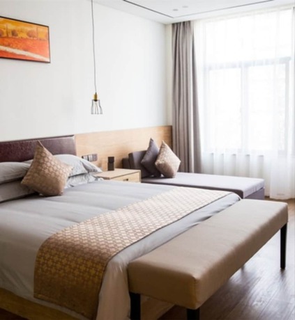 Imagen de la habitación del Hotel Hangzhou Tbo. Foto 7