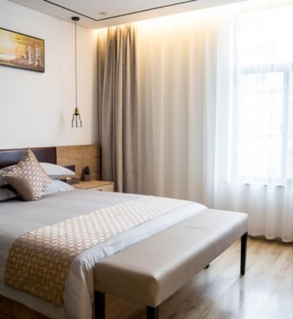 Imagen de la habitación del Hotel Hangzhou Tbo. Foto 16