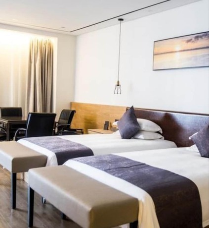 Imagen de la habitación del Hotel Hangzhou Tbo. Foto 18