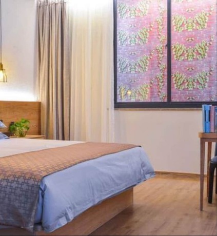 Imagen de la habitación del Hotel Hangzhou Tbo. Foto 19