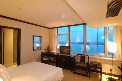 Imagen de la habitación del Hotel Hangzhou Tianyuan Tower. Foto 5