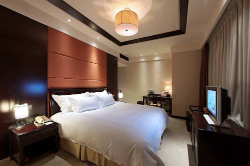 Imagen de la habitación del Hotel Hangzhou Tianyuan Tower. Foto 6