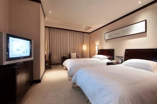 Imagen de la habitación del Hotel Hangzhou Tianyuan Tower. Foto 7