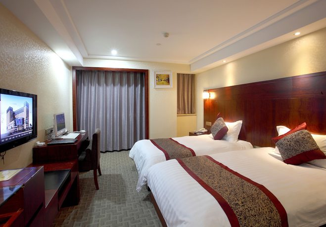 Imagen de la habitación del Hotel Hangzhou West City. Foto 11