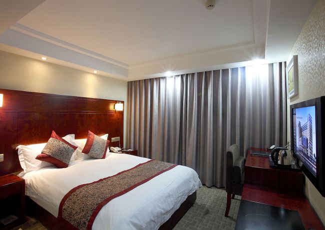 Imagen de la habitación del Hotel Hangzhou West City. Foto 15