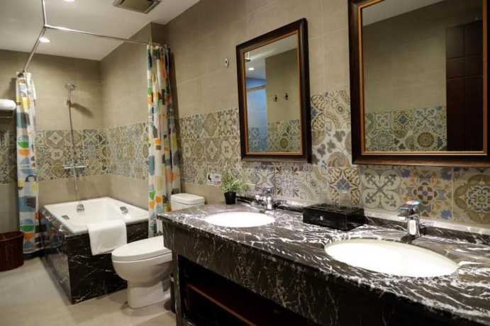 Imagen de la habitación del Hotel Hangzhou Xixi Bieyuan Resort. Foto 6