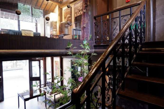Imagen de los interiores del Hotel Hangzhou Xixi Bieyuan Resort. Foto 12